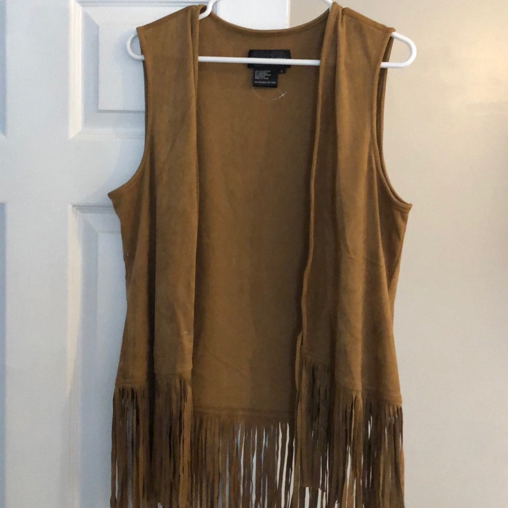 Tan suede vest with fringe. Worn 1x.